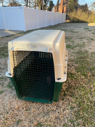 Large Dog crate Large dog crate for dogs 70-90lbs. Missing one small black piece. Pet