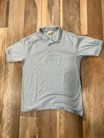Light blue polo shirt Good condition 18-20