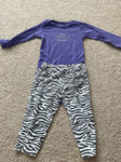 Carters Long sleeve onesie with ruffle butt pants. Pants slightly faded 12 Months