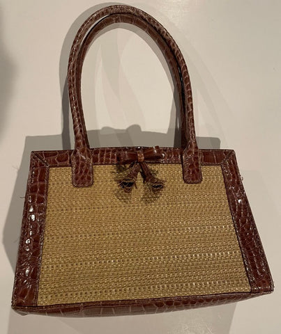 Liz Claiborne Small button up purse. Zipper inside also. Bag