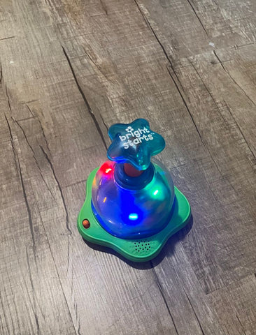 Bright Starts Lights up and inside spins when pressed on top Infant (0-2 yrs)