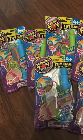 fidget sets 4 fidget sets each uncle rings, zip bracelet, and pop tube Playsets