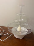 ? Lighted fountain.Used under tiered wedding cake. Some scratches Decor