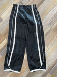 Black nylon type pants size 10/12 white stripe 10