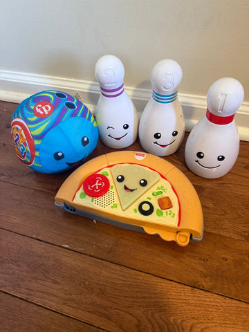Fisher Price Bowling ball pizz set. Ball may need new batteries. Pizza works. Educational