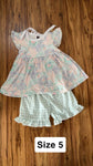 Two piece outfit Runs big IMO cute tie on back of shirt very soft 5T/5