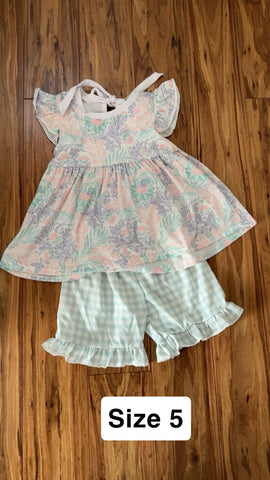 Two piece outfit Runs big IMO cute tie on back of shirt very soft 5T/5