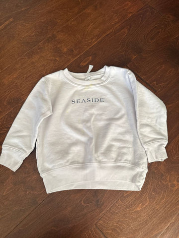 Seaside Untreated yellowing around neck. Says beach baby on back 3T/3