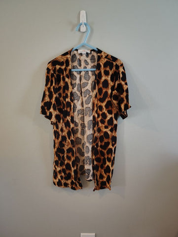 Bailey's Blossom Leopard shrug fits a size 6/7 excellent used condition 6T/6X