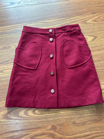 Kate spade Heavy. Lined adorable skirt. Button has been sewn back on. Women's 4