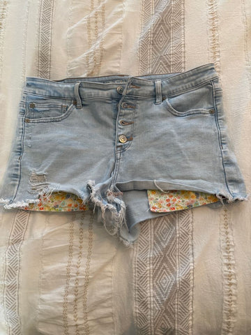 American Eagle Button up light blue distressed shorts Women's 10