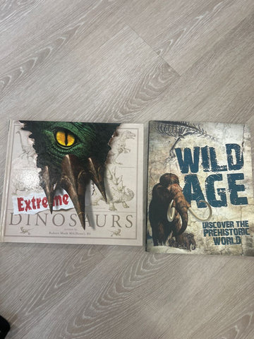 2 prehistoric books 1 hard cover, 1 soft Youth Chapter Book