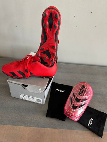 Adidas Cleats new never worn. Includes shinguards/sleeves 4 (Big Kid)